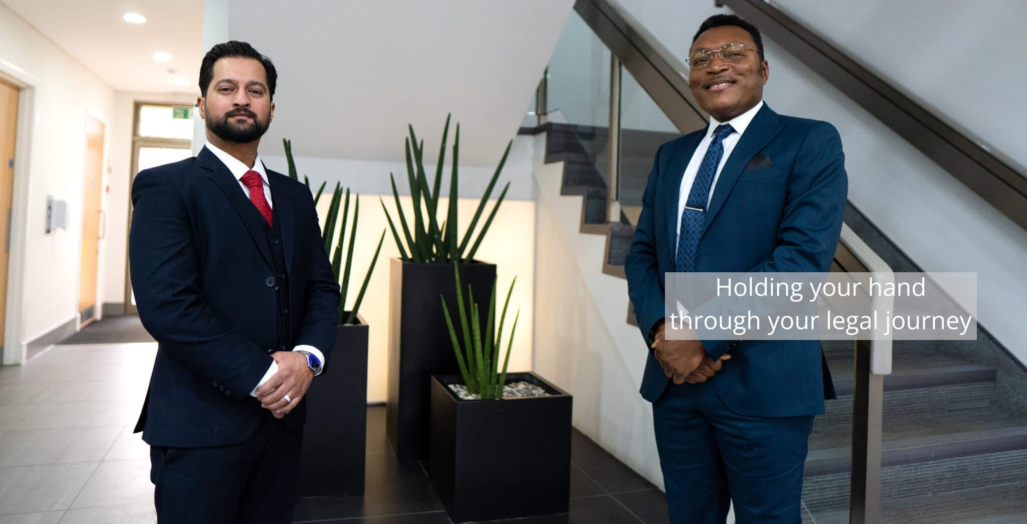 Photo showing Hazelhurst Solicitors Rahim Ahmed and Quddus Ashu at their Manchester Offices